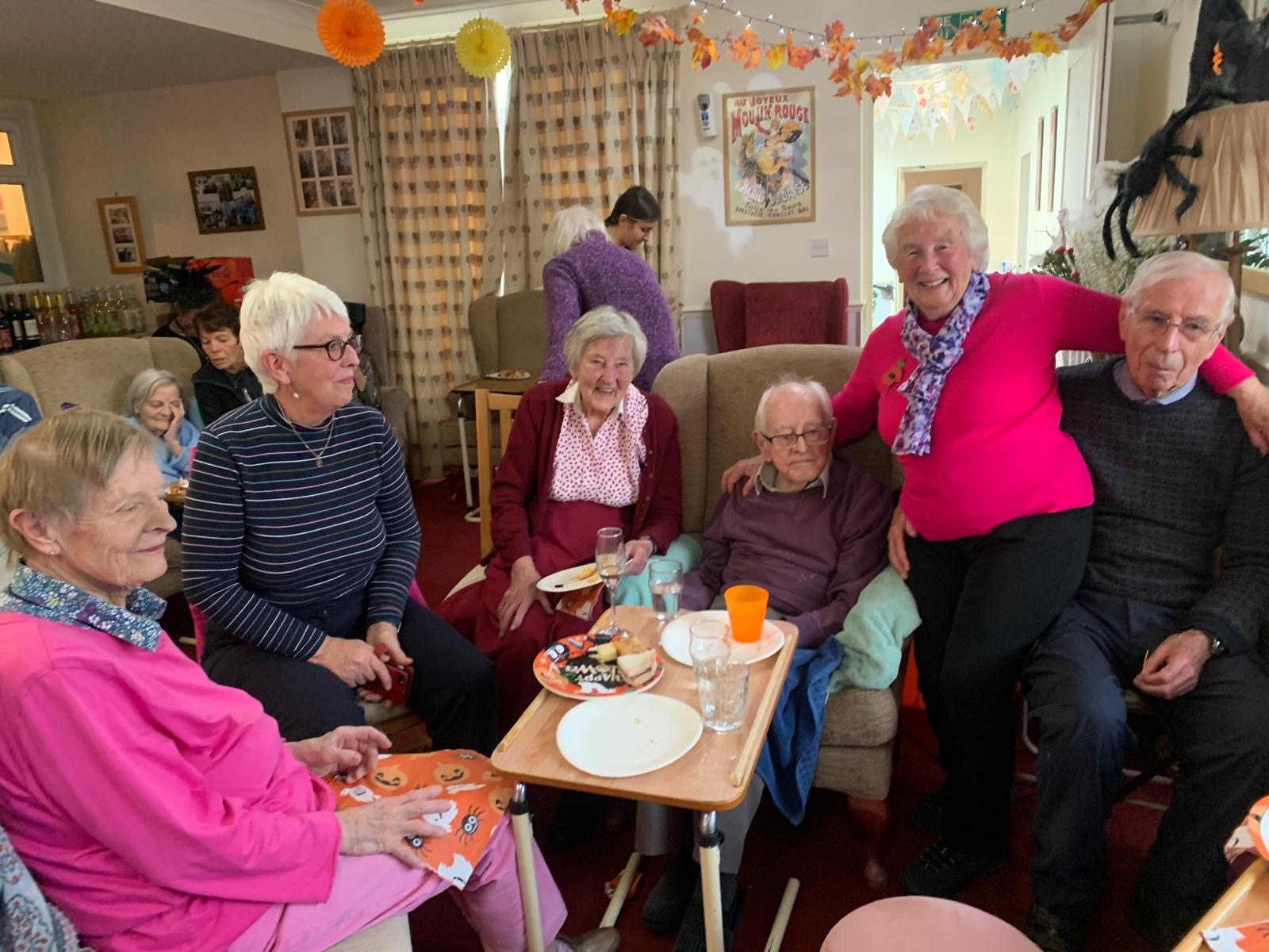 A few residents and relatives enjoying the Halloween party.
